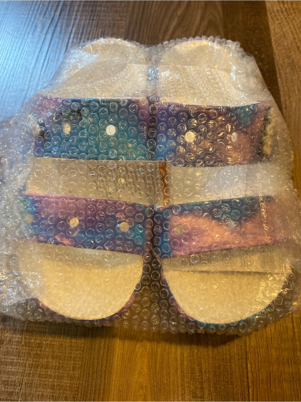 CROCS Galaxy Print Slide Sandals in Blue and Purple